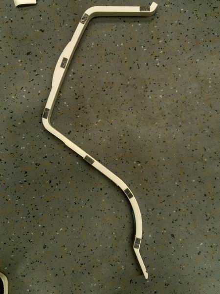 Left wind duct rear cover, 6117H2, with a notch