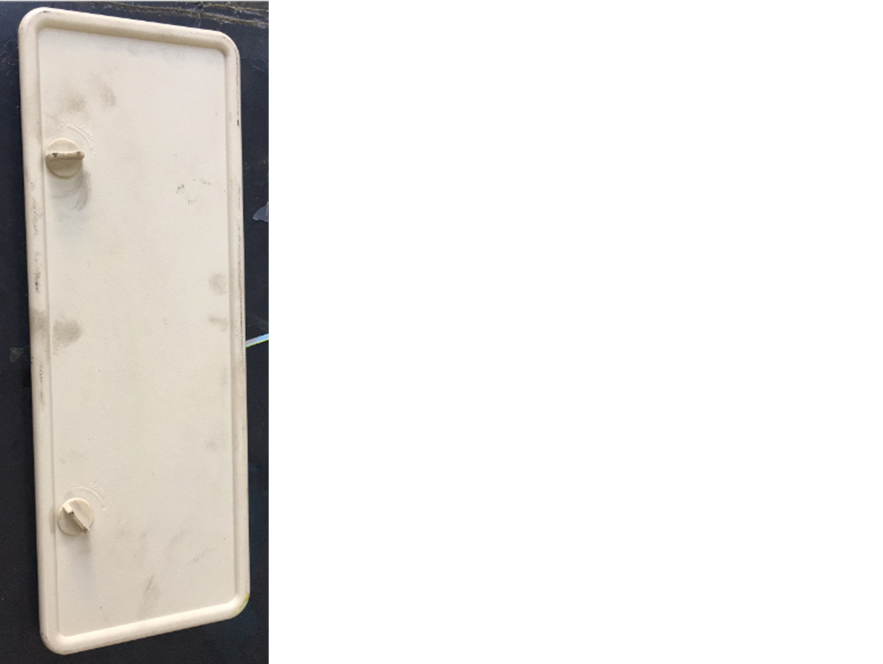 Beige small maintenance door