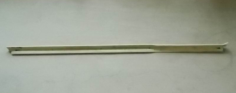 Decorative parts under the frame of the last window at the right