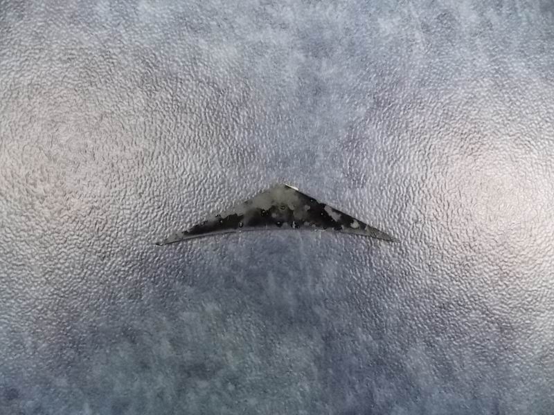 Front windshield upper glass lower corner stop