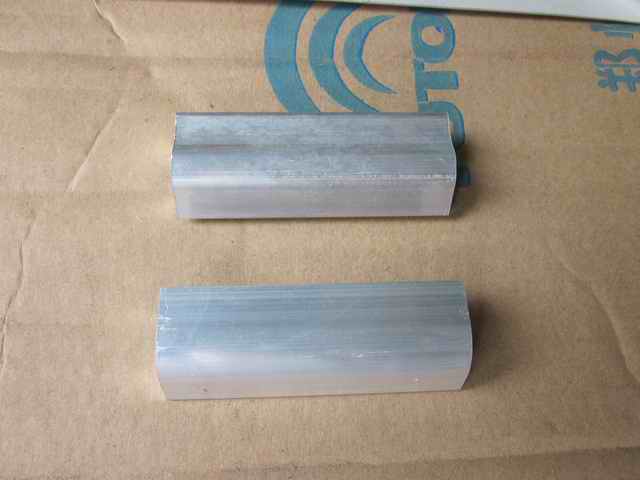 Aluminum sleeve with door hinges