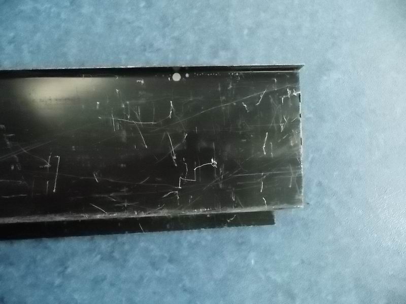 The upper end of the third hatch door on the left-2