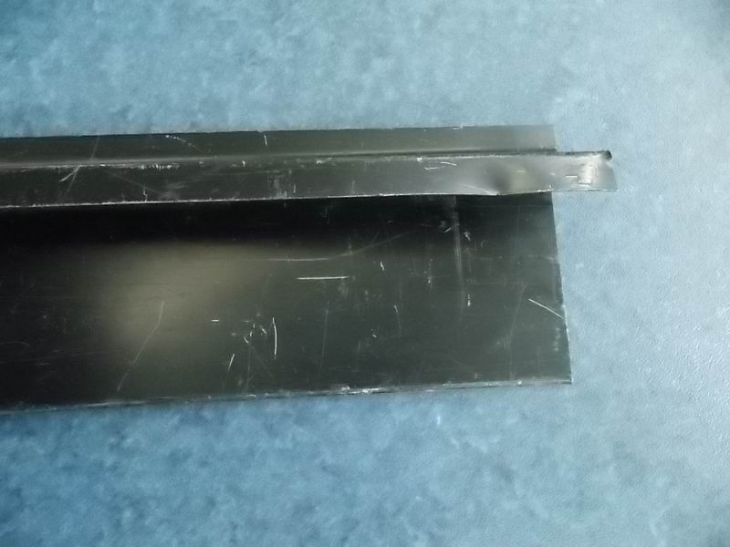 The upper end of the third hatch door on the left-3
