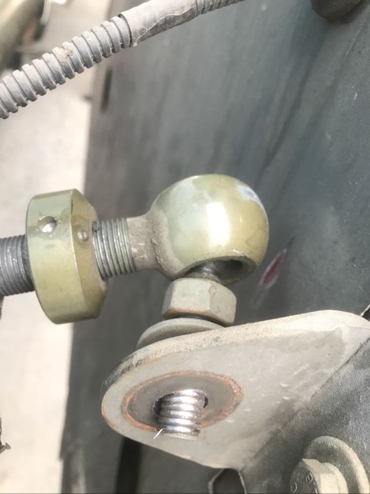 Rotating arm ball head