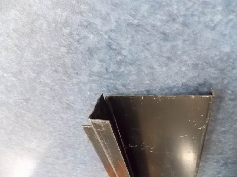 D The upper end of the fifth cabin door on the left-3