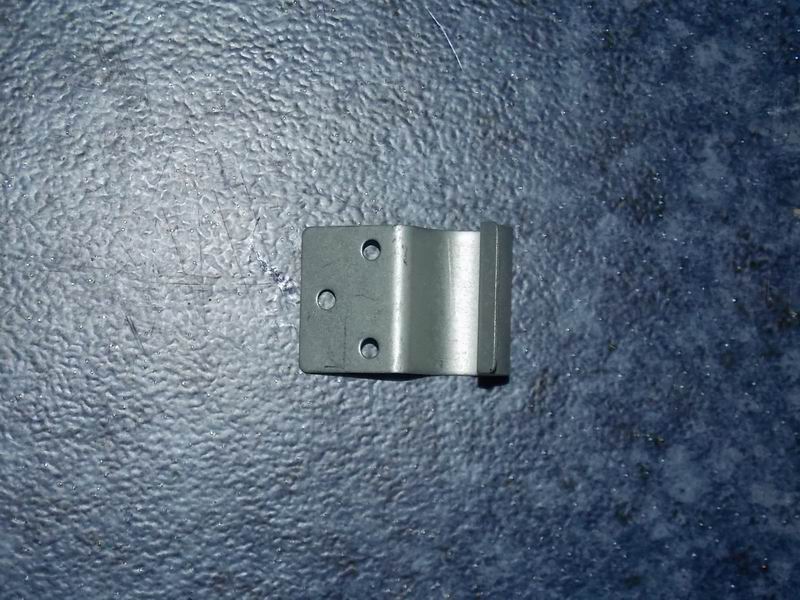 Steel hatch door support clip