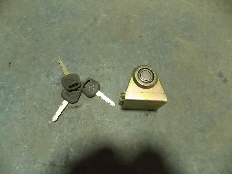 Rear door lock 115B-1