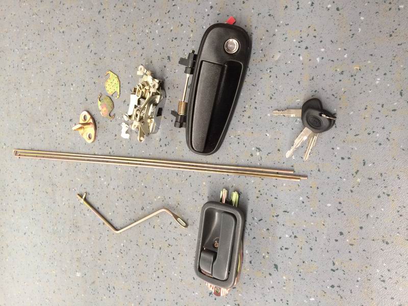 Driver door lock; left outer opening assembly