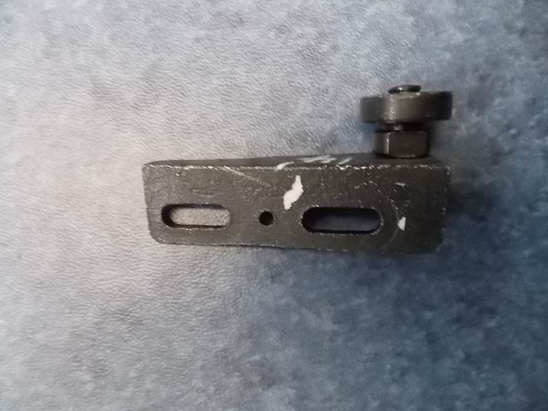 Upper roller bracket assembly (90)-1