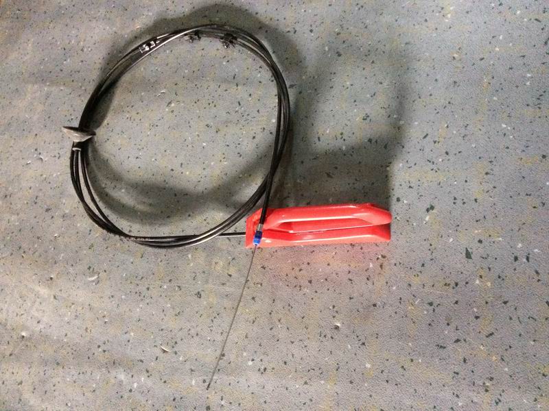 Emergency cable assembly on the inner side of the passenger door