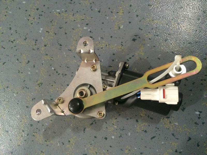 Passenger door unlocking motor