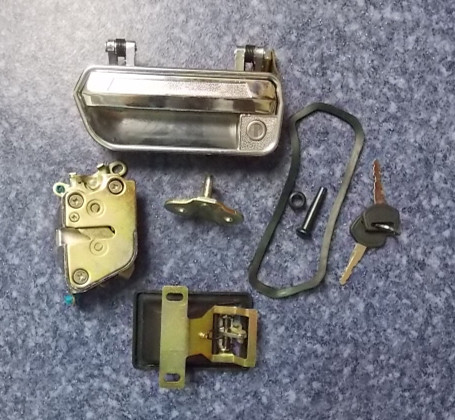 Driver door lock, mini-pad, left 108