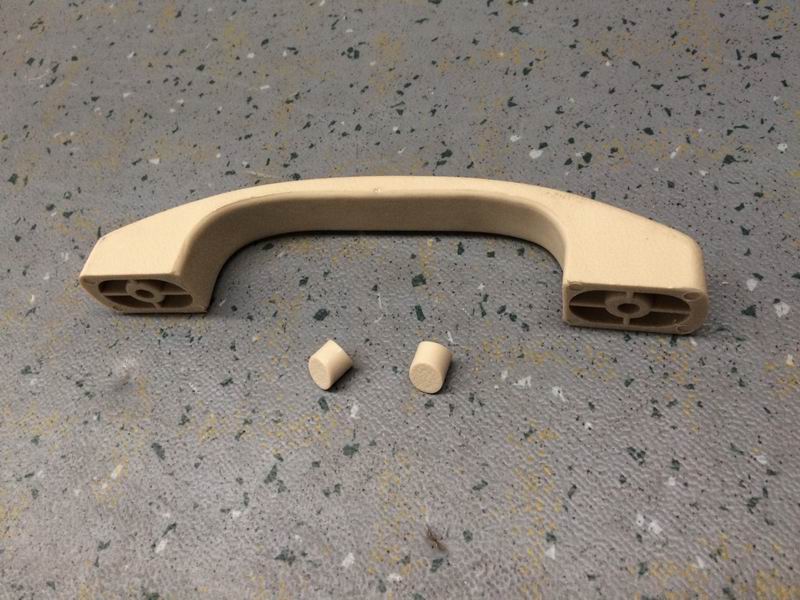 6662DXA9 rear enclosure emergency door handle (beige)