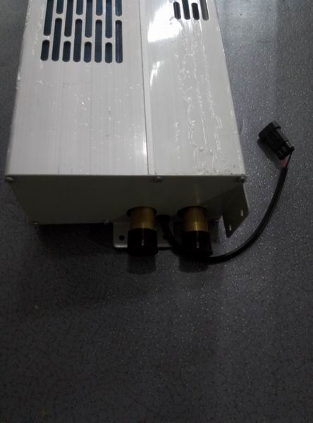 Wall-mounted radiator, one side facing left, water out