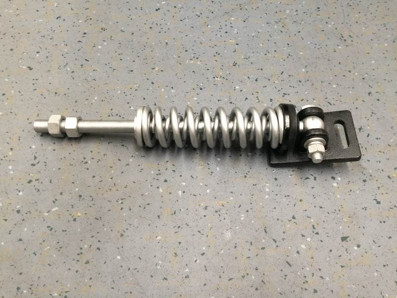 Spring adjustment rod assembly; rod containing; spring; support