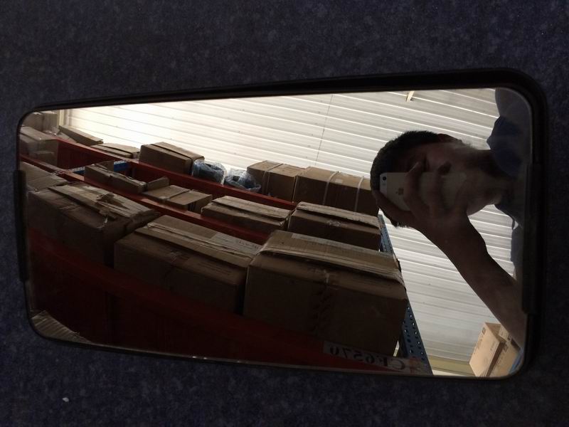 Reverse mirror lens assembly