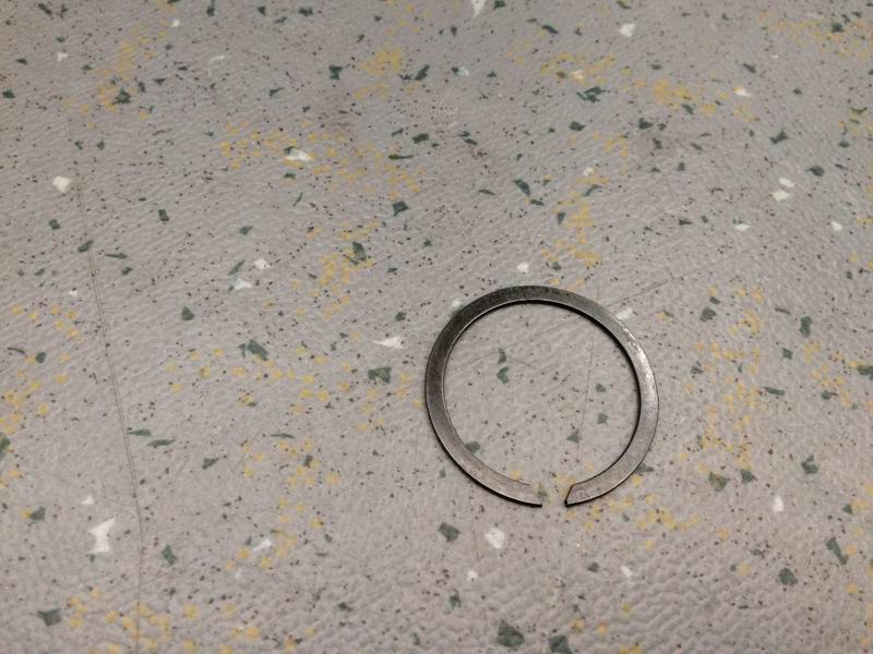 Стопорное кольцо из стальной проволоки сплющенное для вала-1