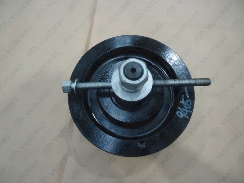 Air conditioner tensioner assembly