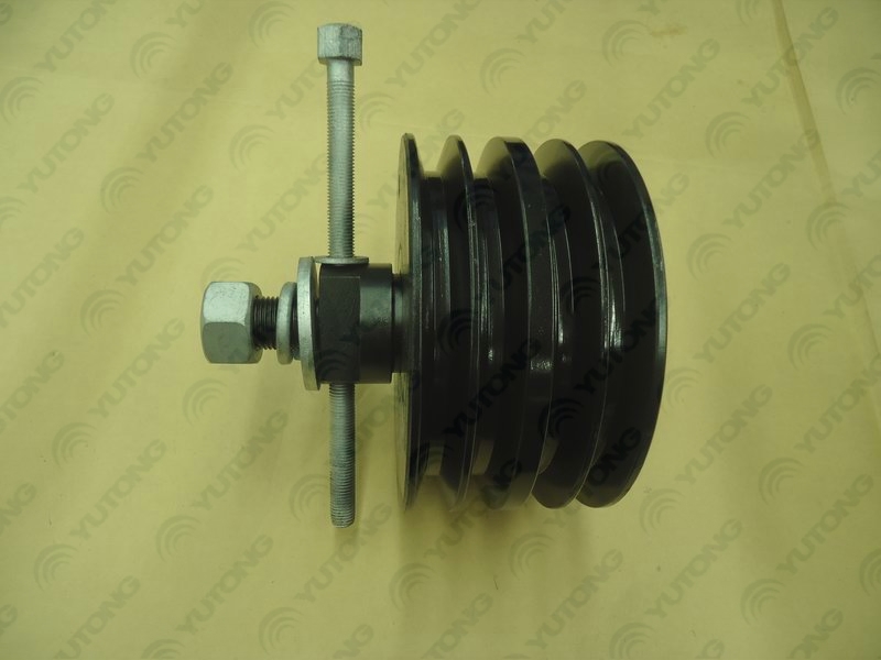 Air conditioner tensioner assembly
